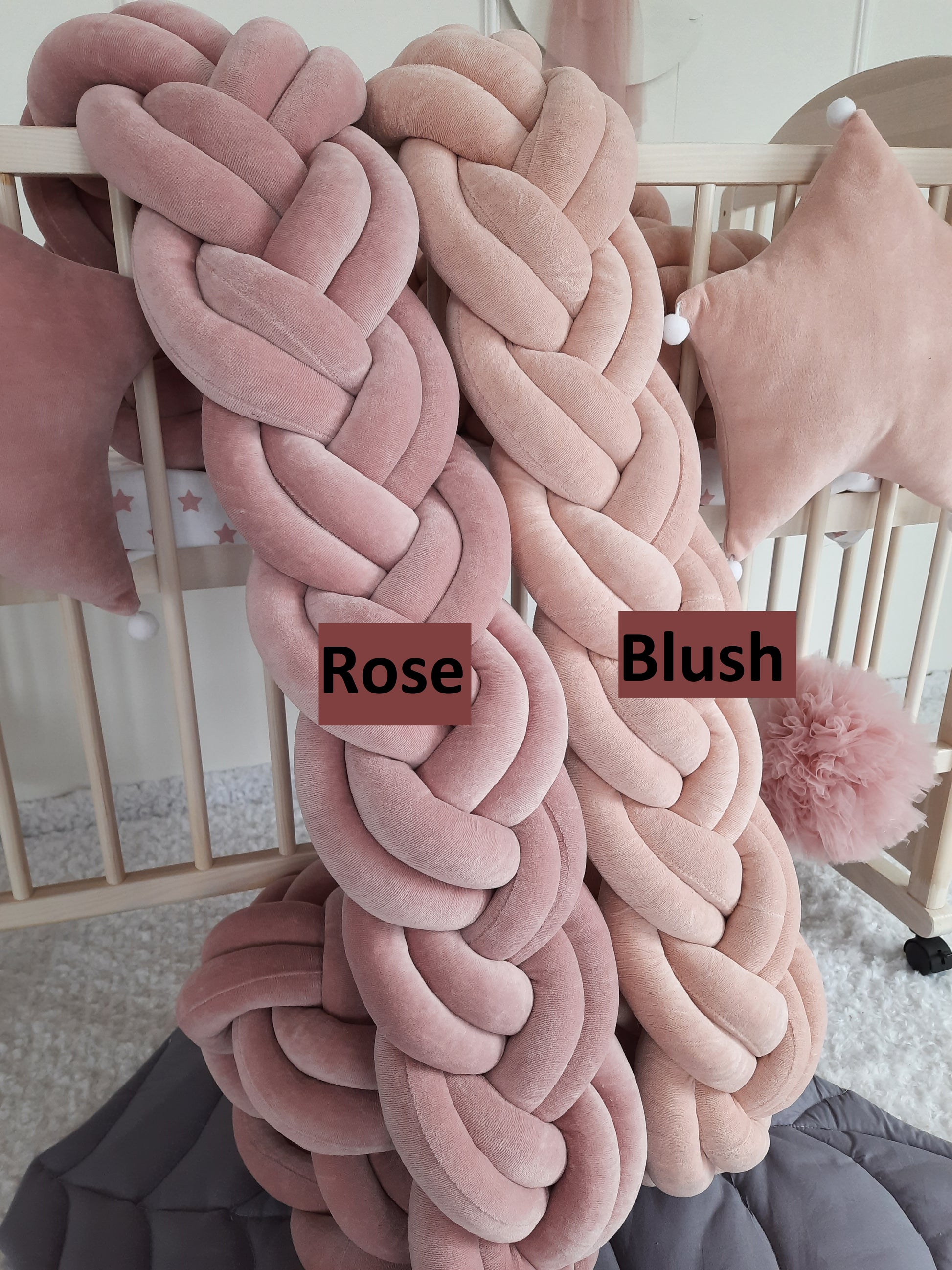 Rose and Blush Double Braided Crib Bumpers with signature of the color. Close Front side slightly angled from the left.