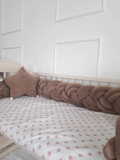 Brown double braided bumper with brown star pillow as a gift on the crib. 100% velor cotton braided crib bumper. Hypoallergenic material with OEKO-TEX certificate