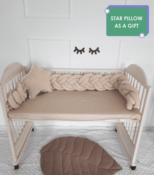 Coffee double braided bumper with coffee star pillow on the crib. Star pillow as a gift. Front side