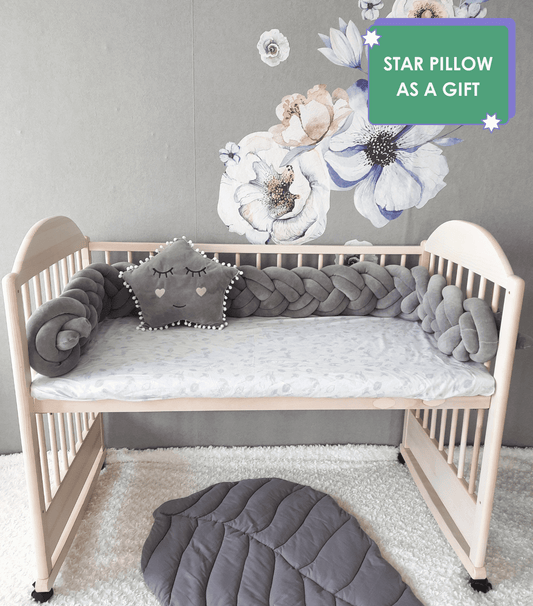 Gray double braided crib bumpers with gold gray star pillow on the crib. Star pillow as a gift. Front side