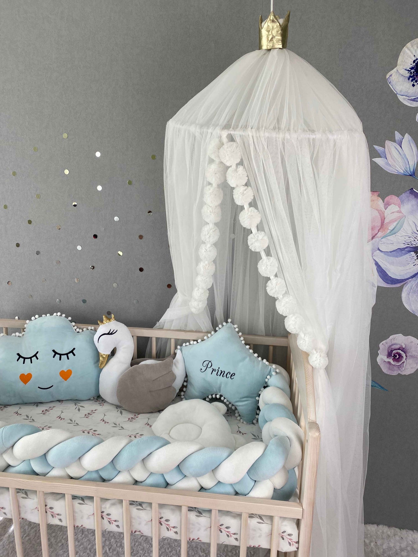 Handmade, premium canopy in white color, braided bumper for bed and cloud, swan, star and orthopedic infant pillows on the crib. 