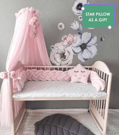 Light Pink Double Braided Crib Bumper with star pillow on the crib with canopy. Star pillow as a gift, Front side. Light pink color.