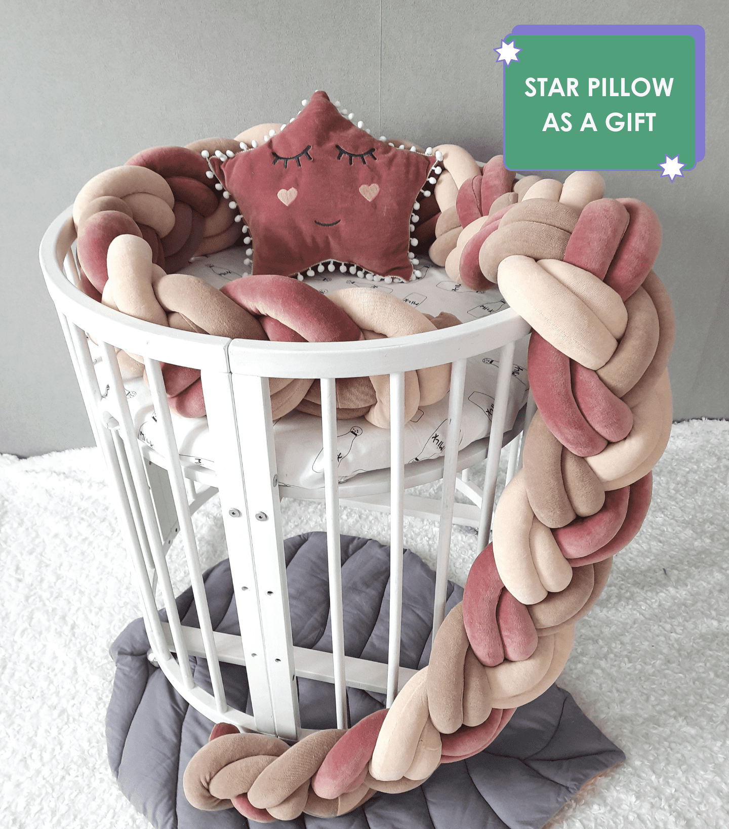 Fresia-Vanilla-Coffee Double Braided Crib Bumper with fresia star pillow on the oval crib. Star pillow as a gift. Front side