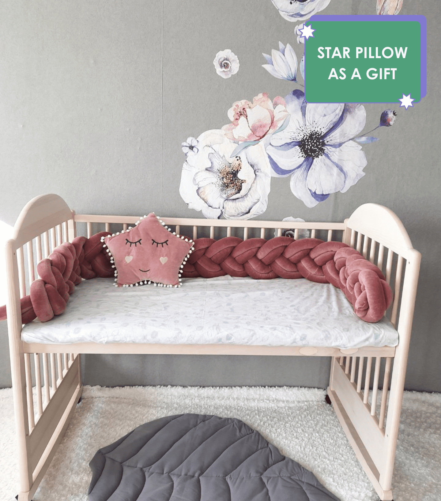 Fresia double braided crib bumpers with gold gray star pillow on the crib. Star pillow as a gift. Front side