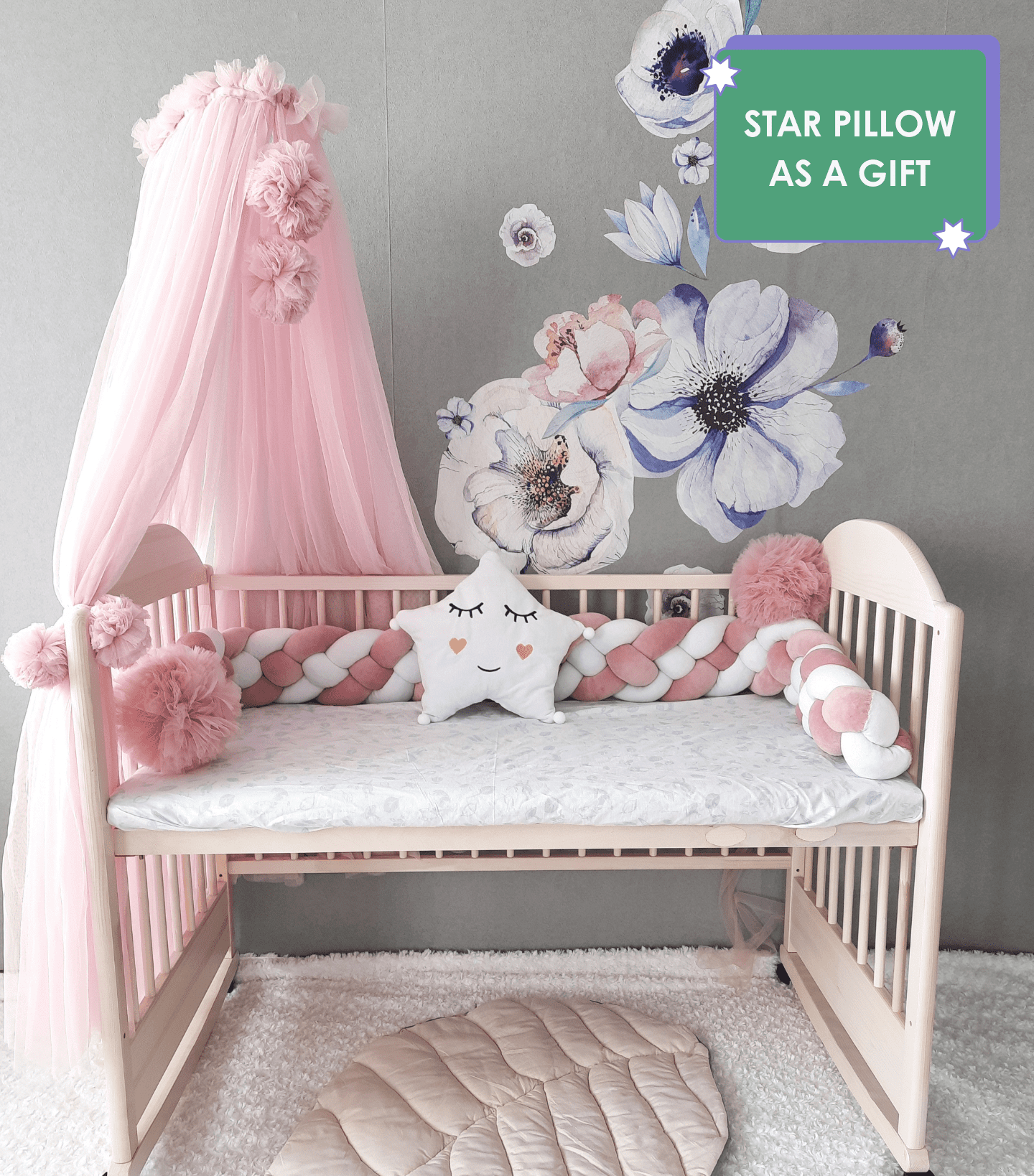 White-Pink Braided Crib Bumper - wearing in 4 strips with white star pillow and pink canopy on the crib. Star pillow as a gift. Front side