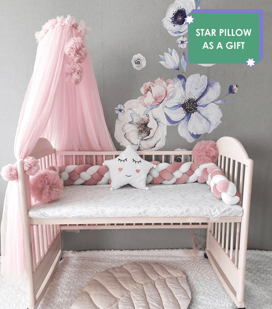 White-Pink Braided Crib Bumper - wearing in 4 strips with white star pillow and pink canopy on the crib. Star pillow as a gift. Front side