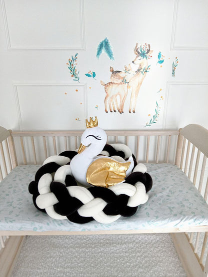 White-black Double Braided Crib Bumper with swan pillow on the crib. Front side