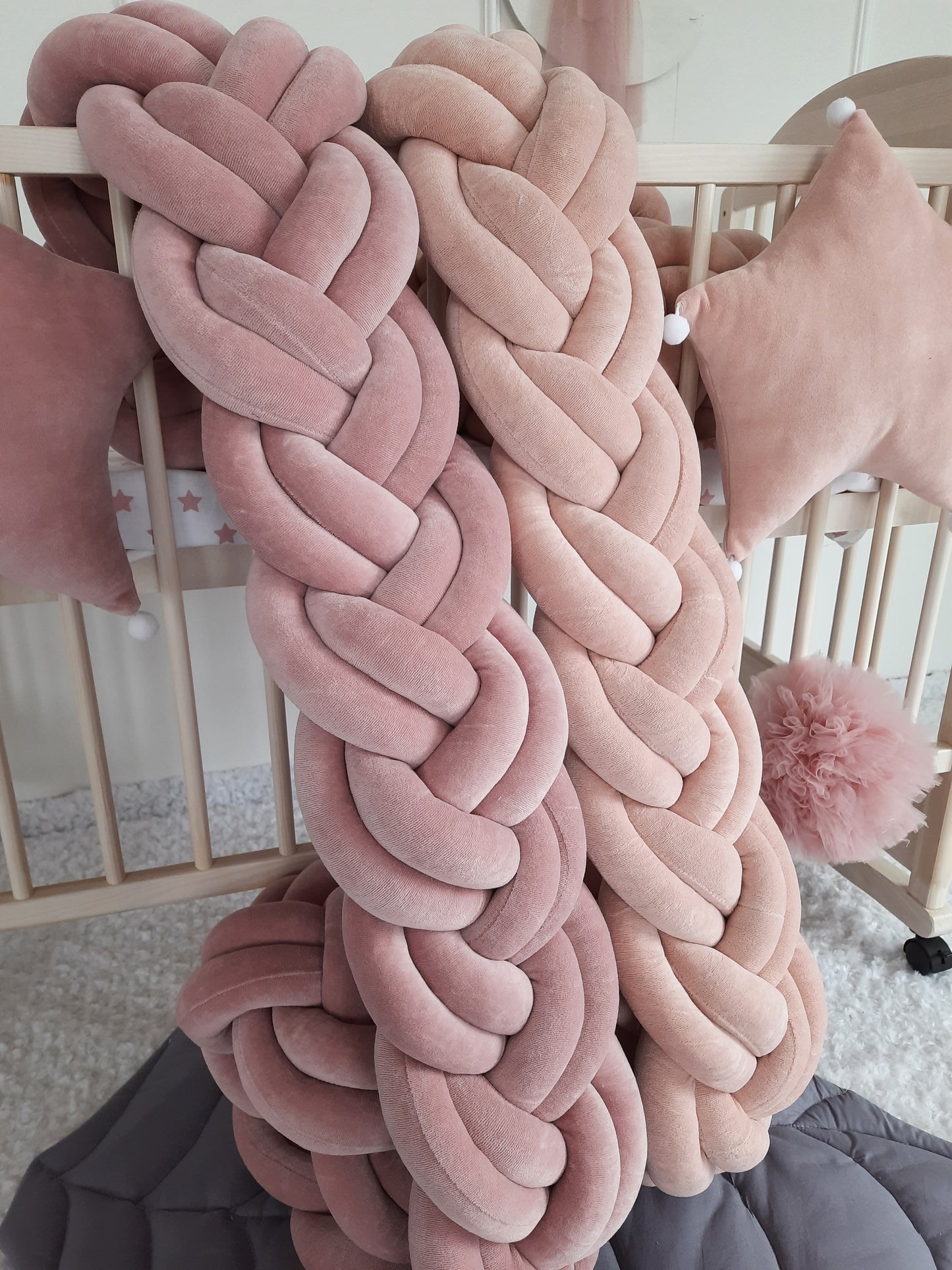 Rose and Blush Double Braided Crib Bumpers. Close Front side slightly angled from the left.